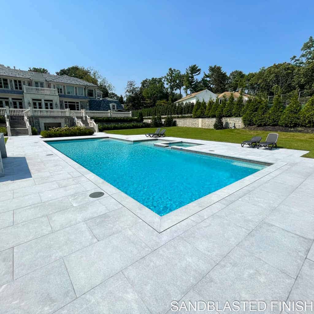 What is the surface finish of the Silver Travertine pavers?