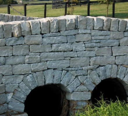 Retaining wall stones and wall blocks